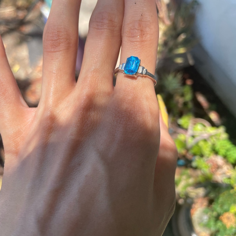 Silver Tone Ring with Bright Blue Gemstone
